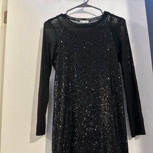 Girls black sequins dress with a sheer top. Good condition.